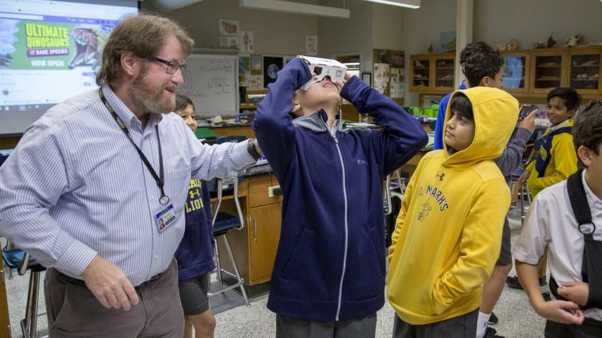 NCSE Teacher John Mead with students